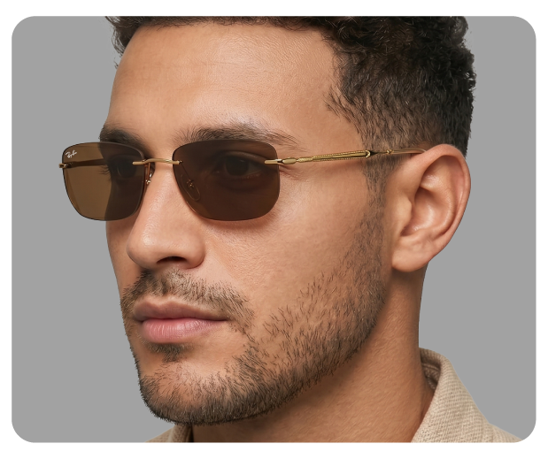 Hombre con gafas de sol Ray-Ban rectangulares al aire